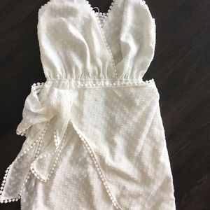 Adjustable strap wrap dress in white!